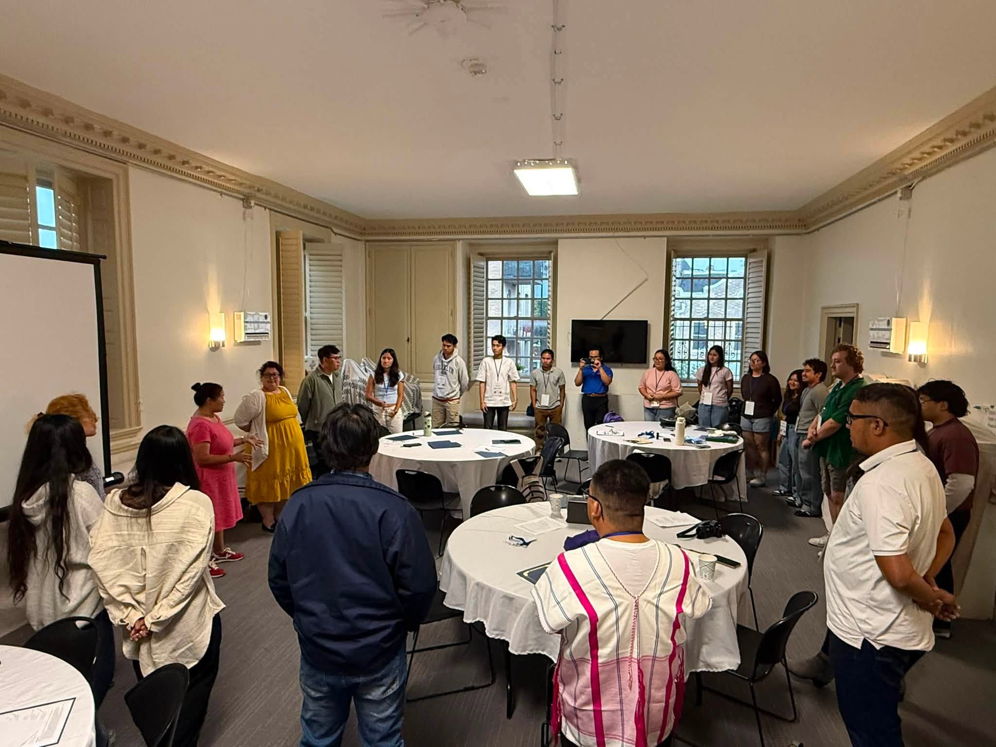 Workshop participants standing in a circle